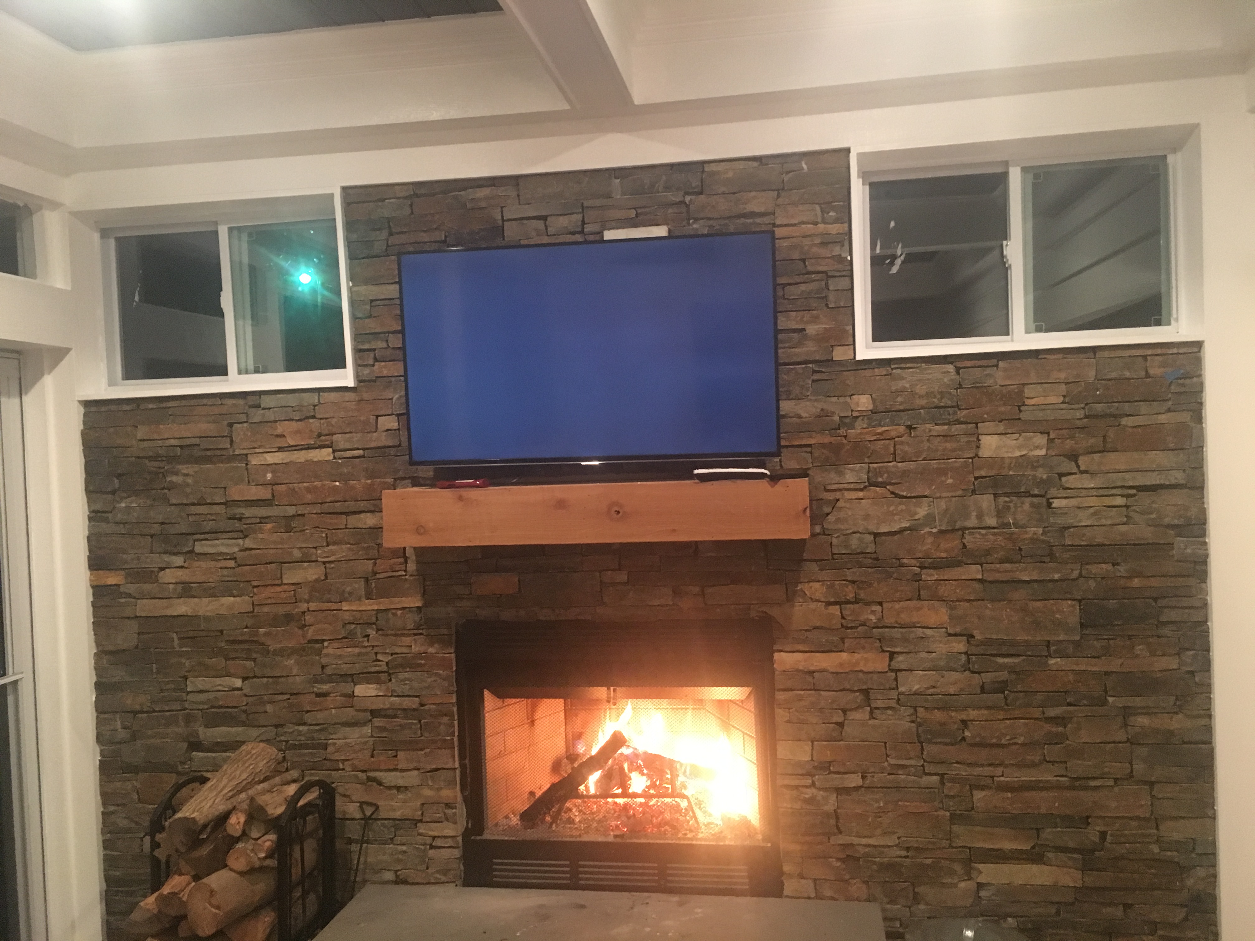 Custom Stone Behind TV and Fireplace