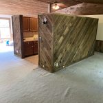 kitchen floating in center of large space